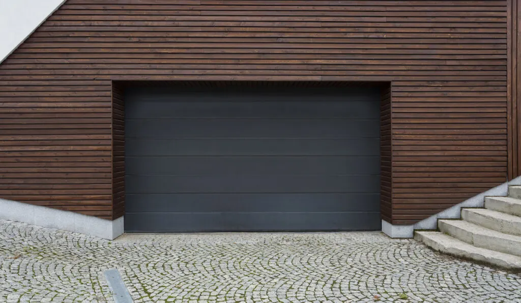 wooden garage with painted door