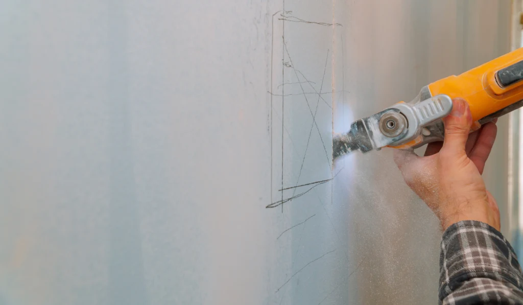 Cutting plasterboard plaster drywall