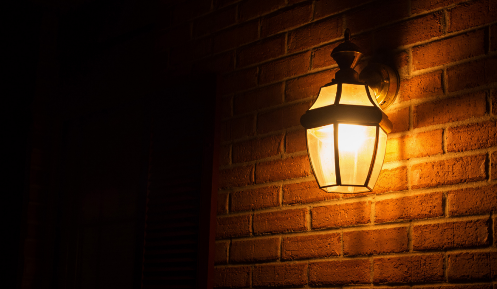 Warm-light-lantern-illuminating-the-front-porch-at-night