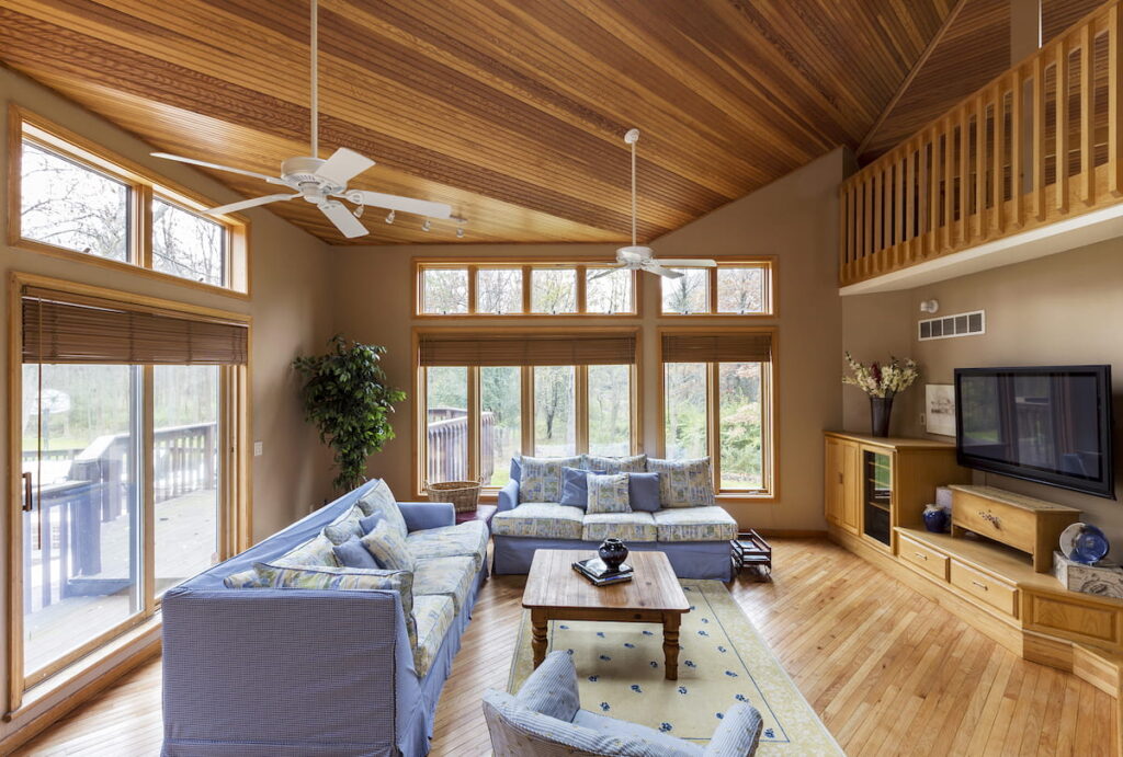 hardwood floor and ceilings in living room