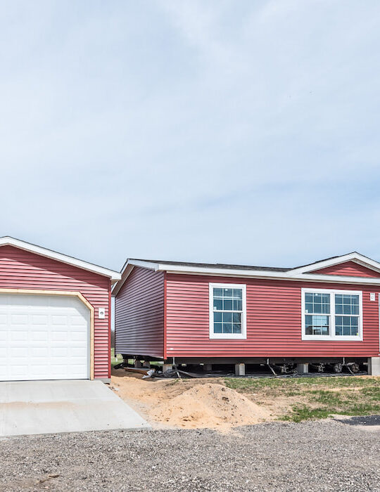 new-manufactured-home-on-red-vinyl-siding