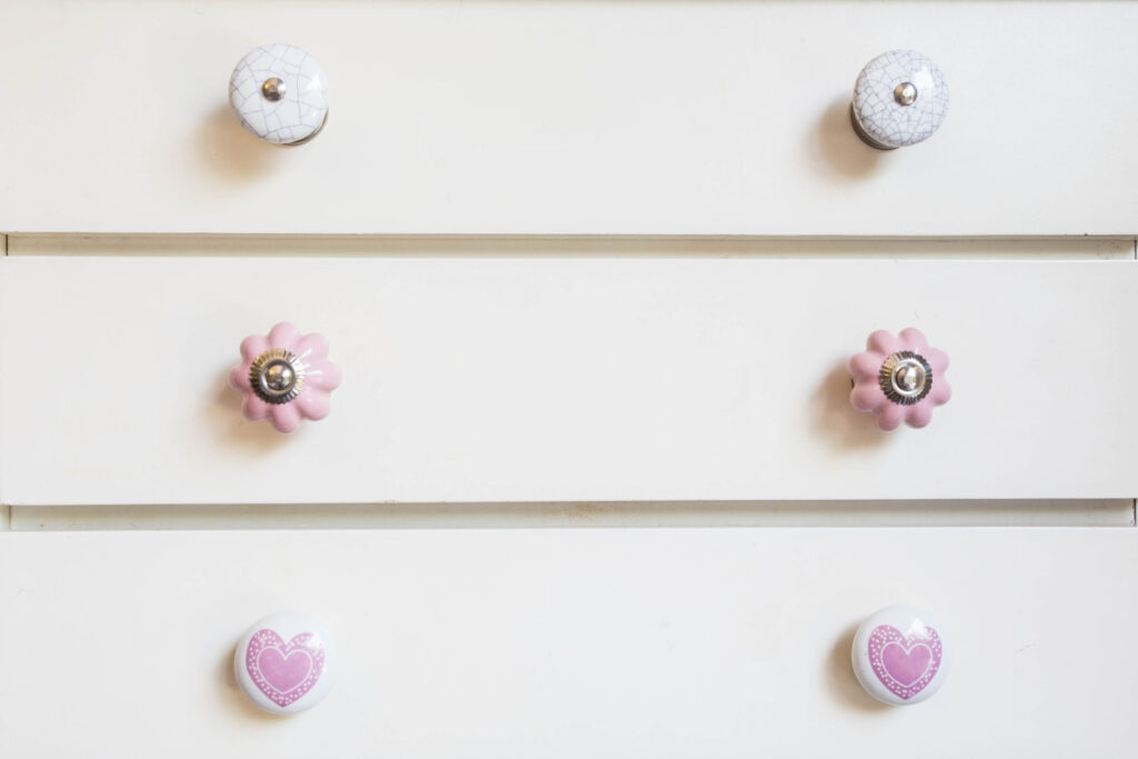 white closet door with different knobs