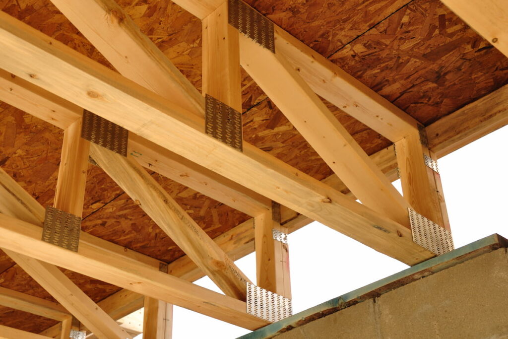 Trusses Above Basement of House at Construction Site