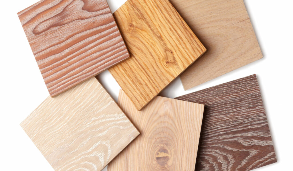  small samples of wooden parquet from different types of wood, different colors and textures 