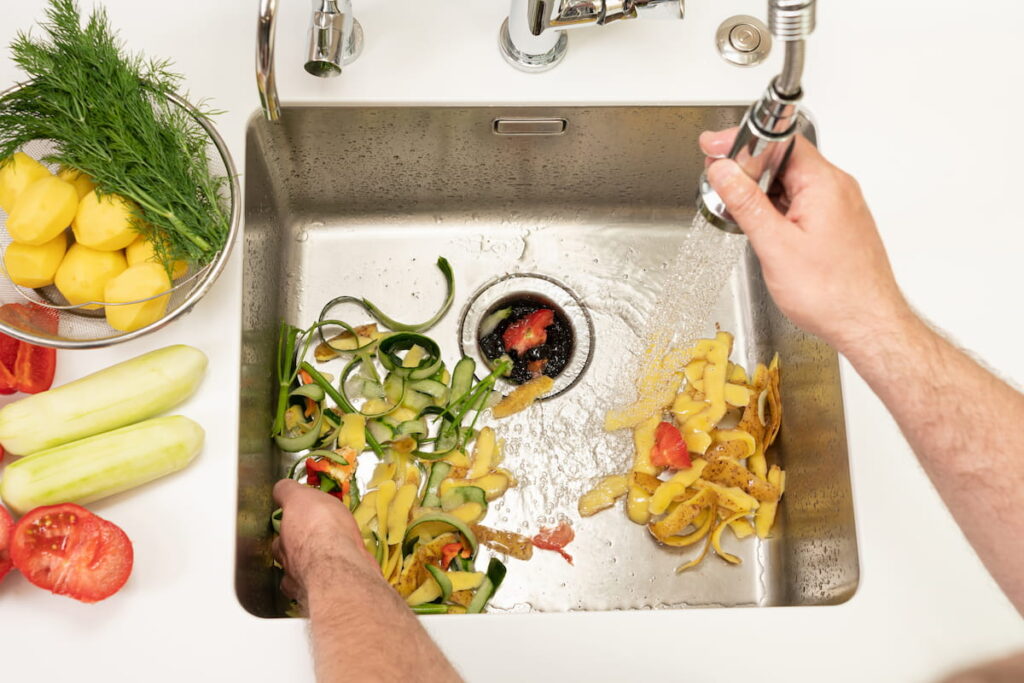 Food waste after peeling vegetables on the sink