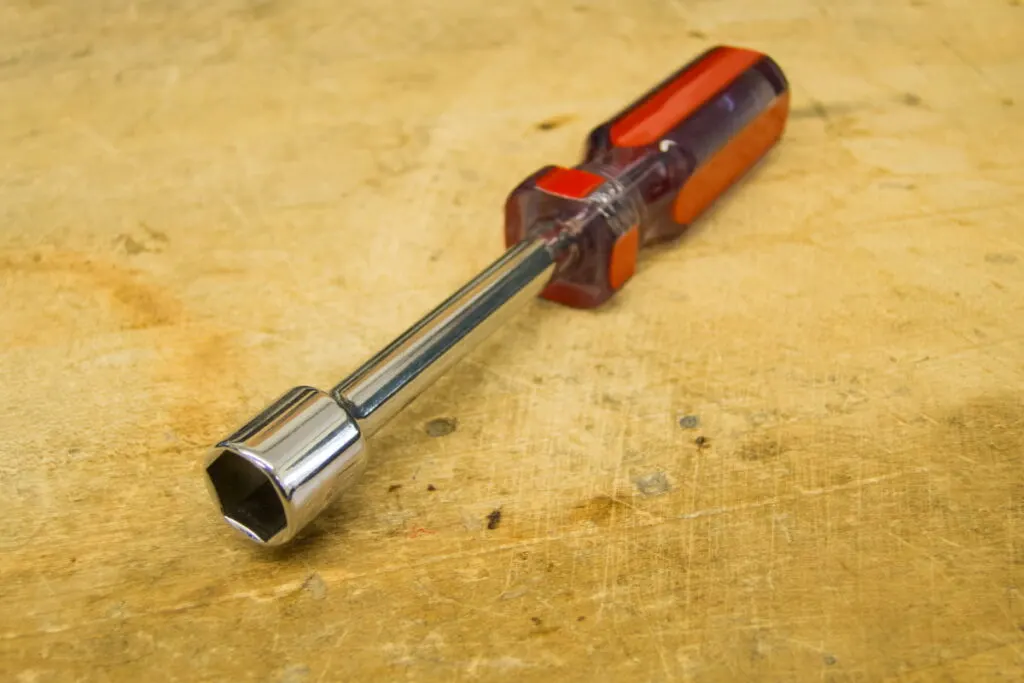 nut driver hand tool on work bench