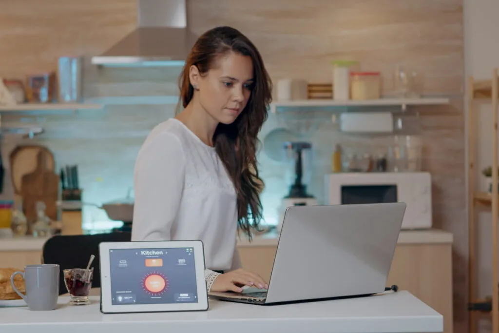 woman using voice activated smart wireless lighting