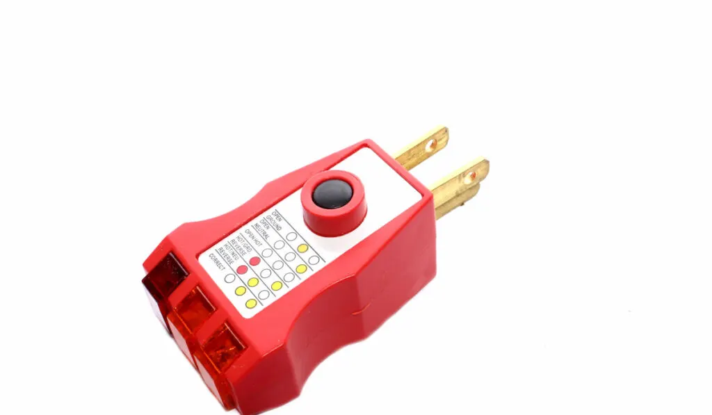 GFCI outlet tester on white background