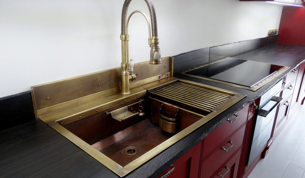 Copper double sink in the kitchen interior