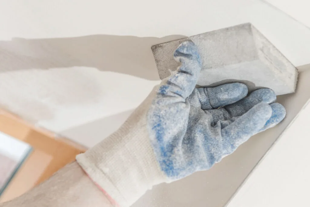 Drywall sanding on a ceiling