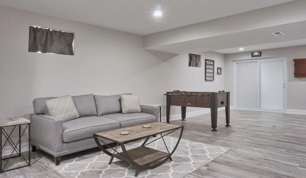Large basement with a modern interior design in bright lighting