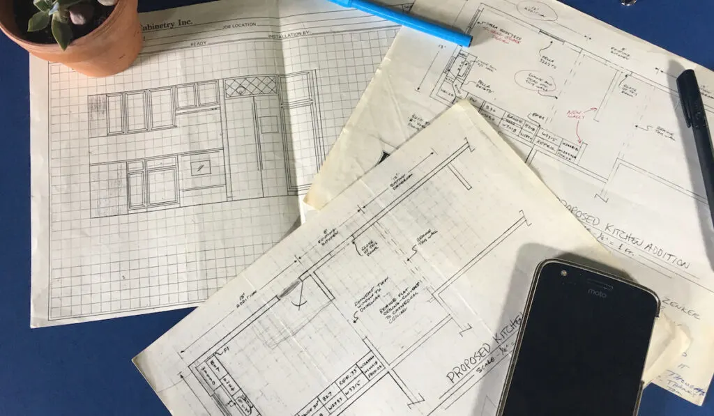 Blue prints for additional on home design on blue desktop